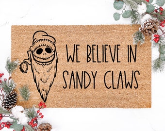 We Believe in Sandy Claws Jack Skellington Doormat