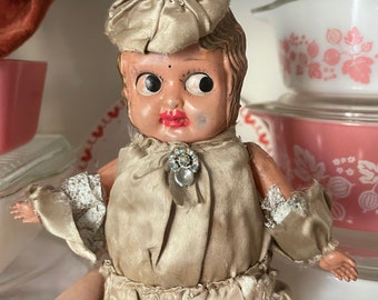 Vintage large composition doll with big eye