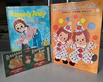 Vintage 1970s Raggedy Ann and Andy lot Paper dolls , book, and label by Whitman Paper dolls unused