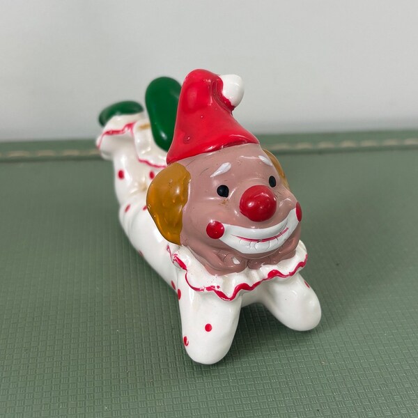 kitschy clown ceramic figurine