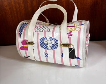 Vintage 1970s  white barrel-shaped purse with pink stripes and a whimsical fashion print kitschy