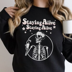 Skeleton Drinking Coffee Sweatshirt: Funny Retro Skull Long Sleeve