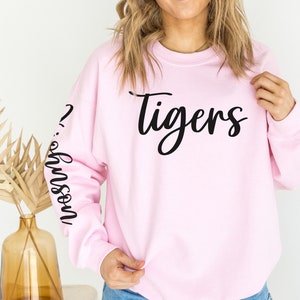 Custom Team Sweatshirt: Personalized Name & Number Sleeve Design