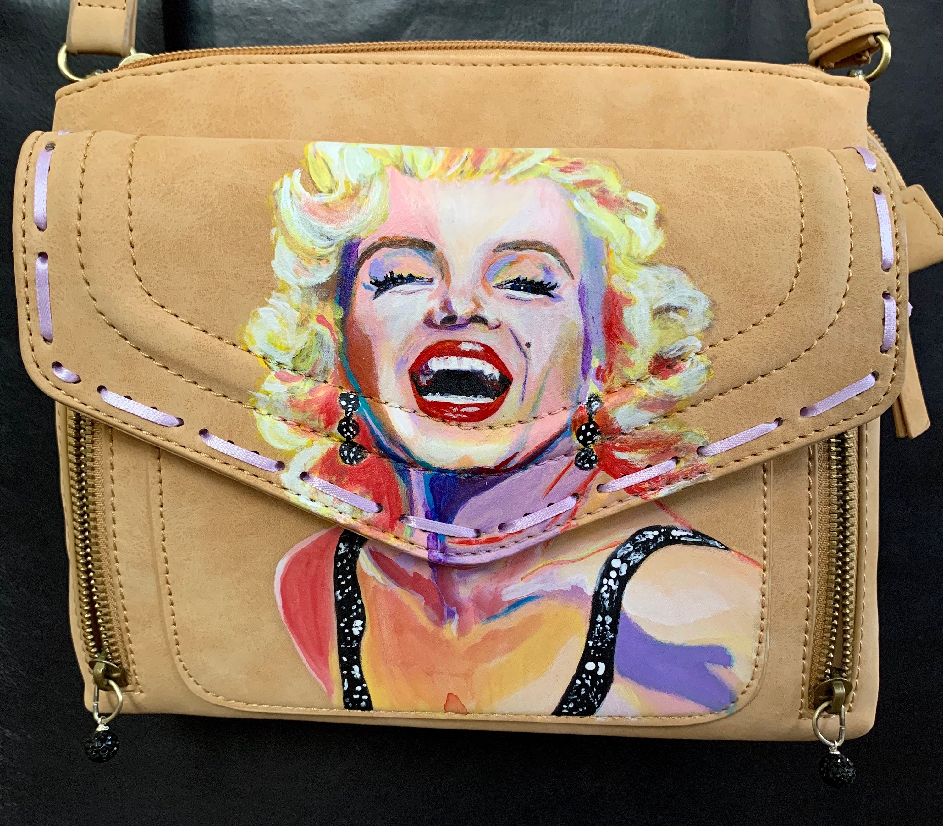 A selection of my custom painted wallets, purses & wristlets