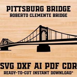 May include: Black and white silhouette of the Roberto Clemente Bridge, also known as the Pittsburgh Bridge. The image includes the text "PITTSBURG BRIDGE" and "ROBERTO CLEMENTE BRIDGE". Below the bridge, the text reads "SVG DXF AI PDF CDR READY-TO-CUT INSTANT DOWNLOAD*"