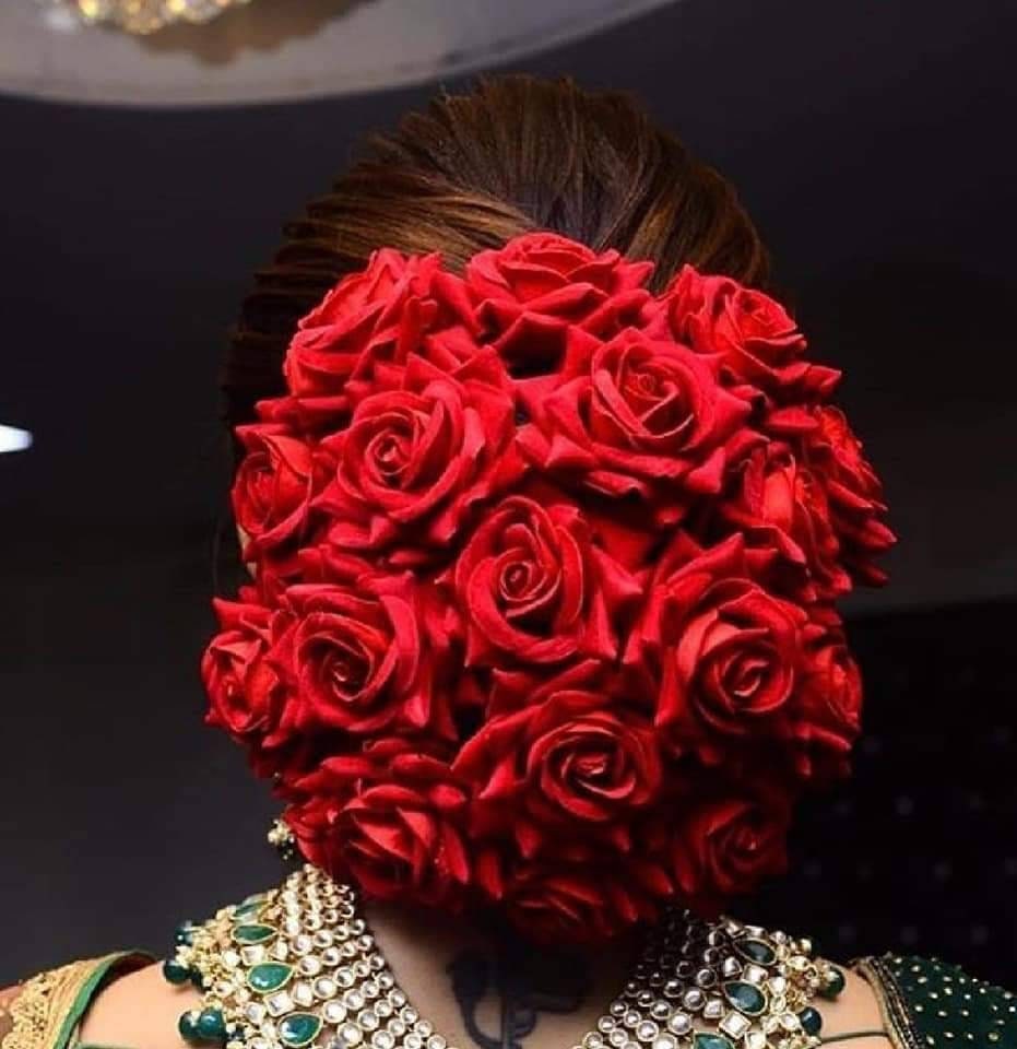 Beautiful pink and white flowers on hair for wedding day. See more on  wedmegood.com #wedmegood #indianwedding #i… | Bridal hairdo, Bridal bun,  White and pink roses