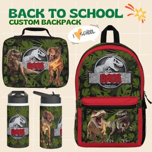 May include: A back-to-school set including a backpack, lunch bag, and water bottles. The items feature a green leaf pattern and dinosaur illustrations. The backpack and lunch bag have red detailing. The text "BACK TO SCHOOL CUSTOM BACKPACK" is visible.