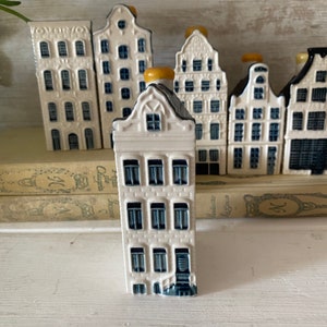 KLM Delft Bols House . Collectible Miniature Delft house numbers 58 KLM Delft House. Sealed with contents.