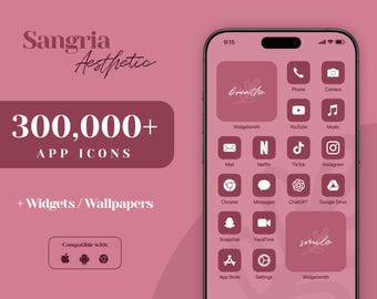 Op de afbeelding: Een roze en wit telefoonscherm met een raster van app-pictogrammen. De pictogrammen zijn allemaal wit en hebben een roze achtergrond. De pictogrammen omvatten: Telefoon, Camera, Youtube, Muziek, Mail, Netflix, Tik Tok, Instagram, Chrome, Berichten, ChatGPT, Google Drive, Snapchat, FaceTime, App Store, Instellingen en Widgetsmith. Het telefoonscherm heeft ook een roze achtergrond met de tekst "breathe" en "smile" in wit.