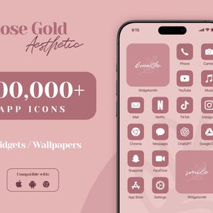 May include: A screenshot of a smartphone displaying a rose gold aesthetic app icon pack. The icons are arranged in a grid pattern and include popular apps like Instagram, YouTube, and Netflix. The phone screen also displays the text "breathe" and "smile" in a rose gold font.