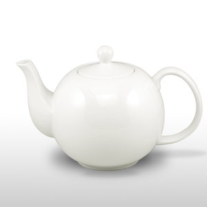 May include: A white ceramic teapot with a spherical body, a curved spout, and a loop handle. The lid features a small knob. The teapot is designed for brewing tea and has a glossy finish.