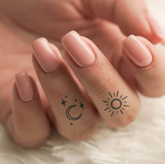 39 Lovely Moon Finger Tattoos  Hand and finger tattoos Moon tattoo  designs Finger tattoos