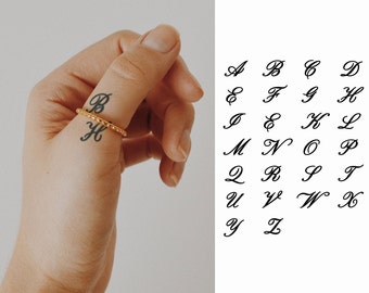 Gorgeous letter H tattooed on the hand
