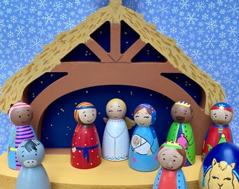 Peg doll nativity, bright nativity, childrens nativity, diverse toys, bethlehem scene, christmas decor, bible stories, festive decorations