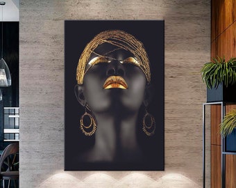 May include: A black and gold abstract portrait of a woman with her eyes closed. The woman is wearing gold jewelry and a gold headpiece.