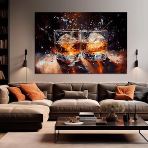May include: An abstract painting of two whiskey glasses with ice cubes, set against a dark background. The artwork hangs above a brown sectional sofa with orange throw pillows. The room features bookshelves and a coffee table.