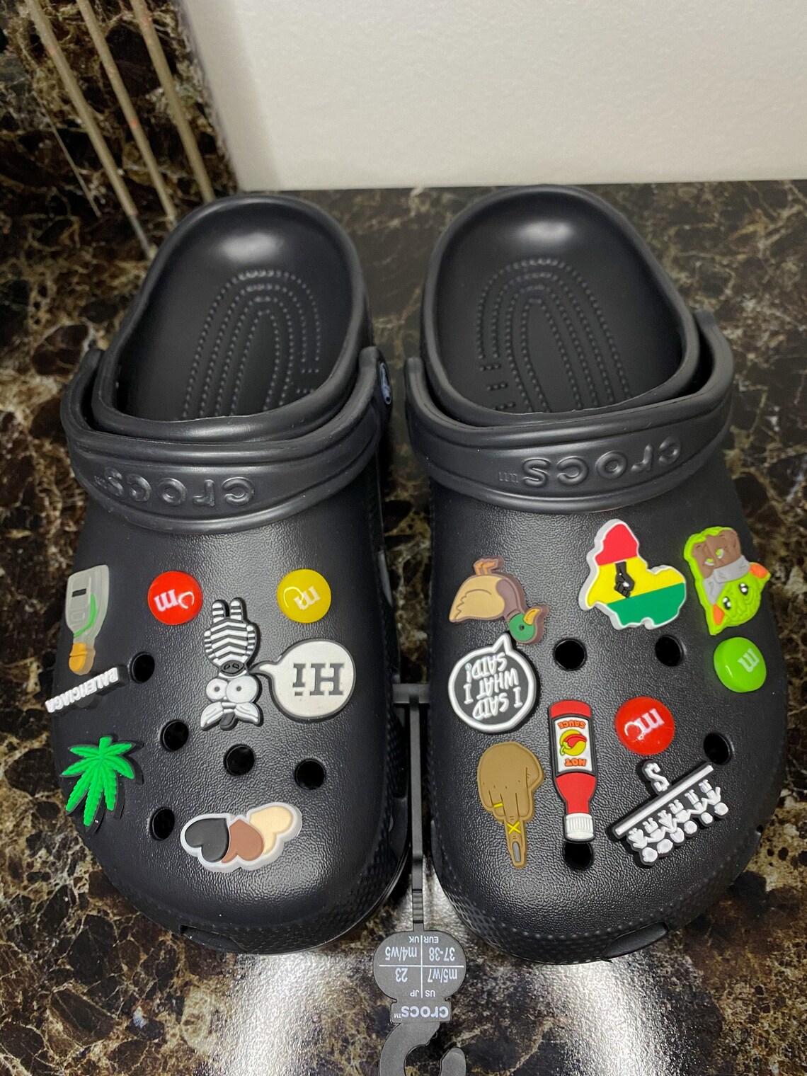 what stores sell charms for crocs