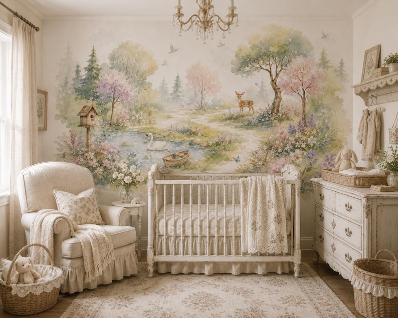 May include: A nursery room featuring a large watercolour wall mural of a forest landscape with a deer, a swan on a pond, and a small boat. The room includes a white wooden crib, a cream-coloured upholstered armchair, a dresser, and woven baskets.