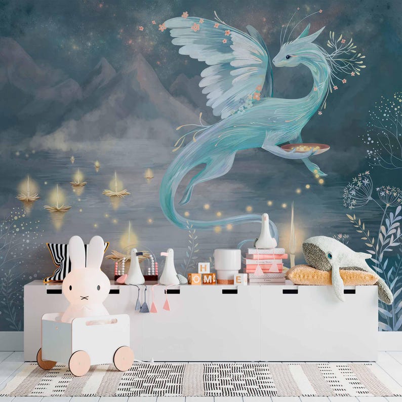 A serene wallpaper featuring a graceful, winged dragon with delicate floral accents hovering above a tranquil lake. The dragon is illuminated by glowing floating candles, surrounded by soft foliage and a backdrop of misty mountains under a starry sky