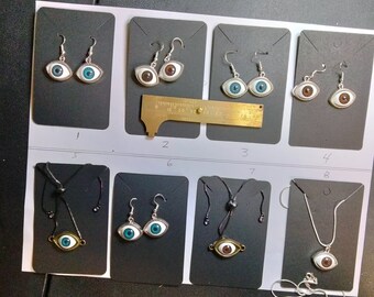 Evil Eye Schmuck Set: Ohrhänger, verstellbare Armbänder, Silberkette