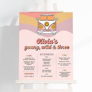 May include: A pink and yellow illustrated poster featuring a white van with a smiley face and flowers. The poster reads "Olivia's young, wild & three" and lists things Olivia loves, her favourites, and what she can do.