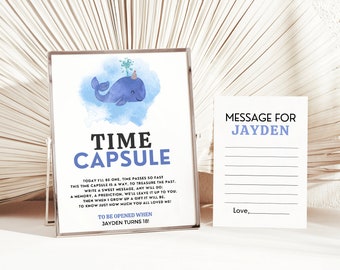 Può includere: Una balena blu con un cappello da festa su uno sfondo acquerellato blu. Il testo "Time Capsule" è in lettere nere. Il testo "Today I'll be one, time passes so fast. This time capsule is a way to treasure the past. Write a sweet message, any will do: a memory, a prediction. We'll leave it up to you. Then when I grow up a gift it will be to know just how much you all loved me! To be opened when Jayden turns 18!" è in lettere nere. Un biglietto bianco con il testo "Message for Jayden" in lettere nere e una riga per scrivere un messaggio. Il testo "Love," è in lettere nere.