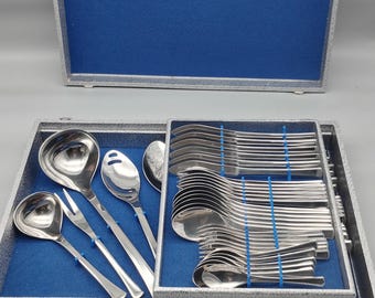 Iconische vintage AMC bestekset Elypsis FF 18/10 in een koffer, 65-delige set voor 12 personen, inclusief serveerbestek in de originele koffer.