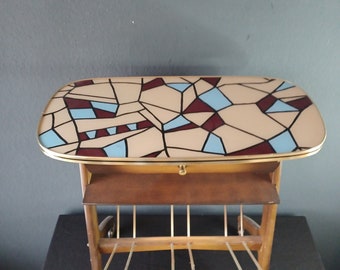 Vintage newspaper table with rockabilly mosaic tile pattern, 1960s