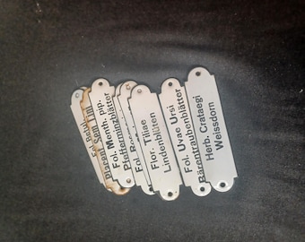 Old pharmacy enamel signs for an old pharmacy cabinet, spices, herbs