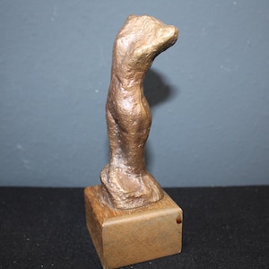 Modern sculpture in bronze on a wooden base, abstract figure, female torso