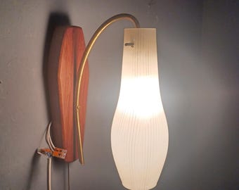 Mid Century Rocke Billy wall lamp with wooden sign and drop-shaped glass lampshade.