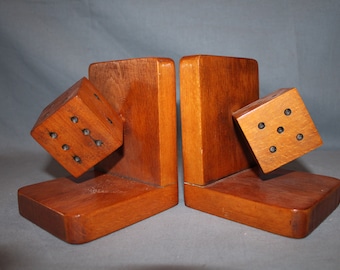 Fantastic mid century wooden bookends in the form of two cubes.