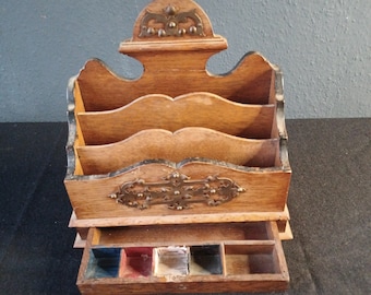 Antique letter holder with small drawer made of wood with decorations made of copper sheet.