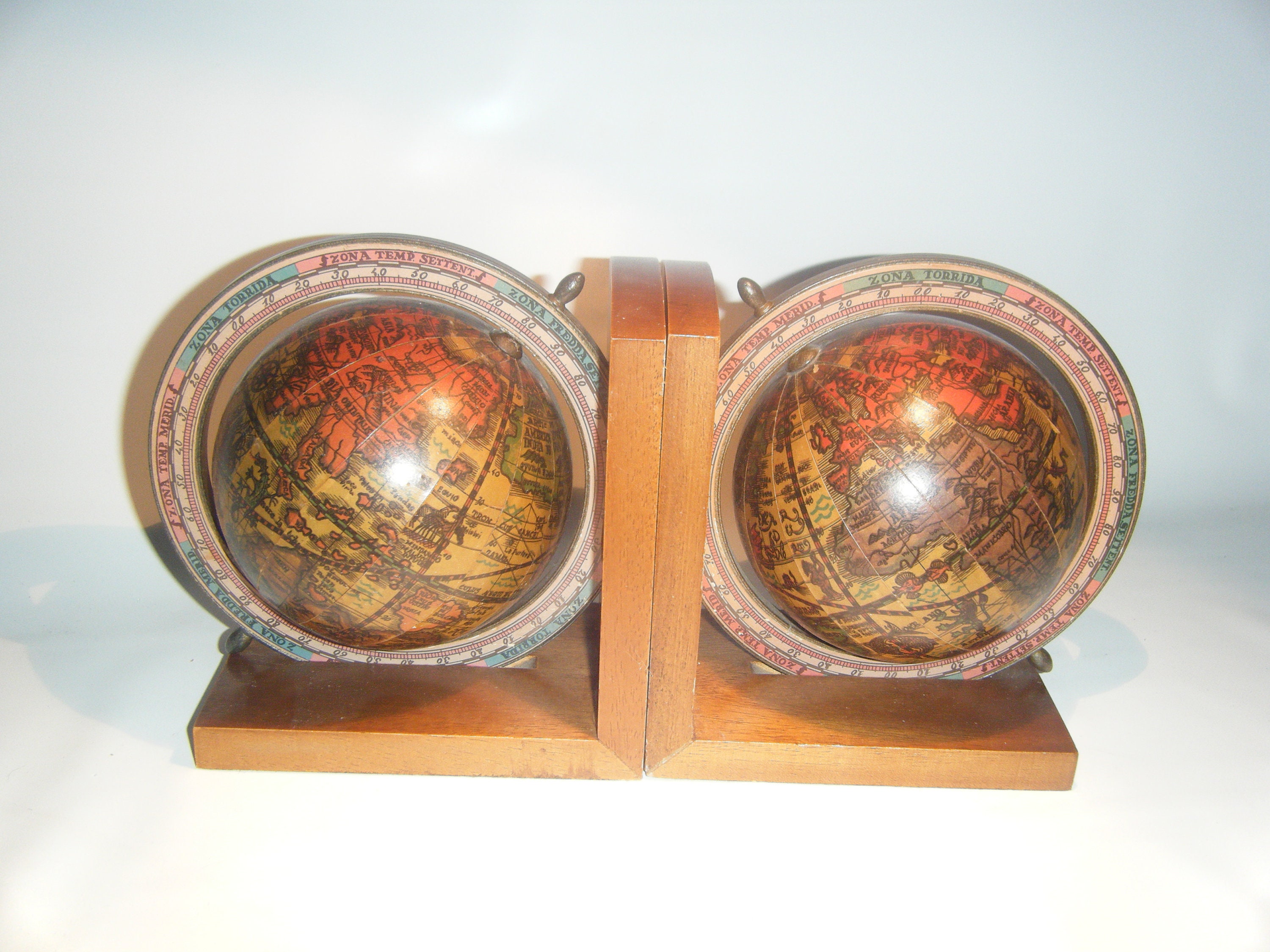 Nice pair of bookends in the form of globes.