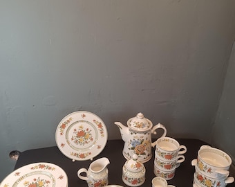 Complementary pieces from the Villeroy & Boch Summerday collection: breakfast plate, egg cup, coffee cup, soup cup, coffee pot, soup plate, dinner plate