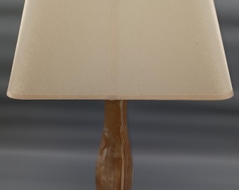 Elegant alabaster table lamp with a rectangular lampshade.