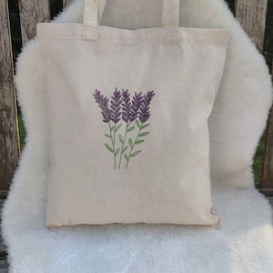 Jutebeutel beige mit Blumenmotiv, perfekt zum nachhaltigen Einkaufen ohne Plastik