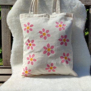 Jutebeutel mit Blumenmuster zum nachhaltigen Einkaufen, aus Baumwollstoff