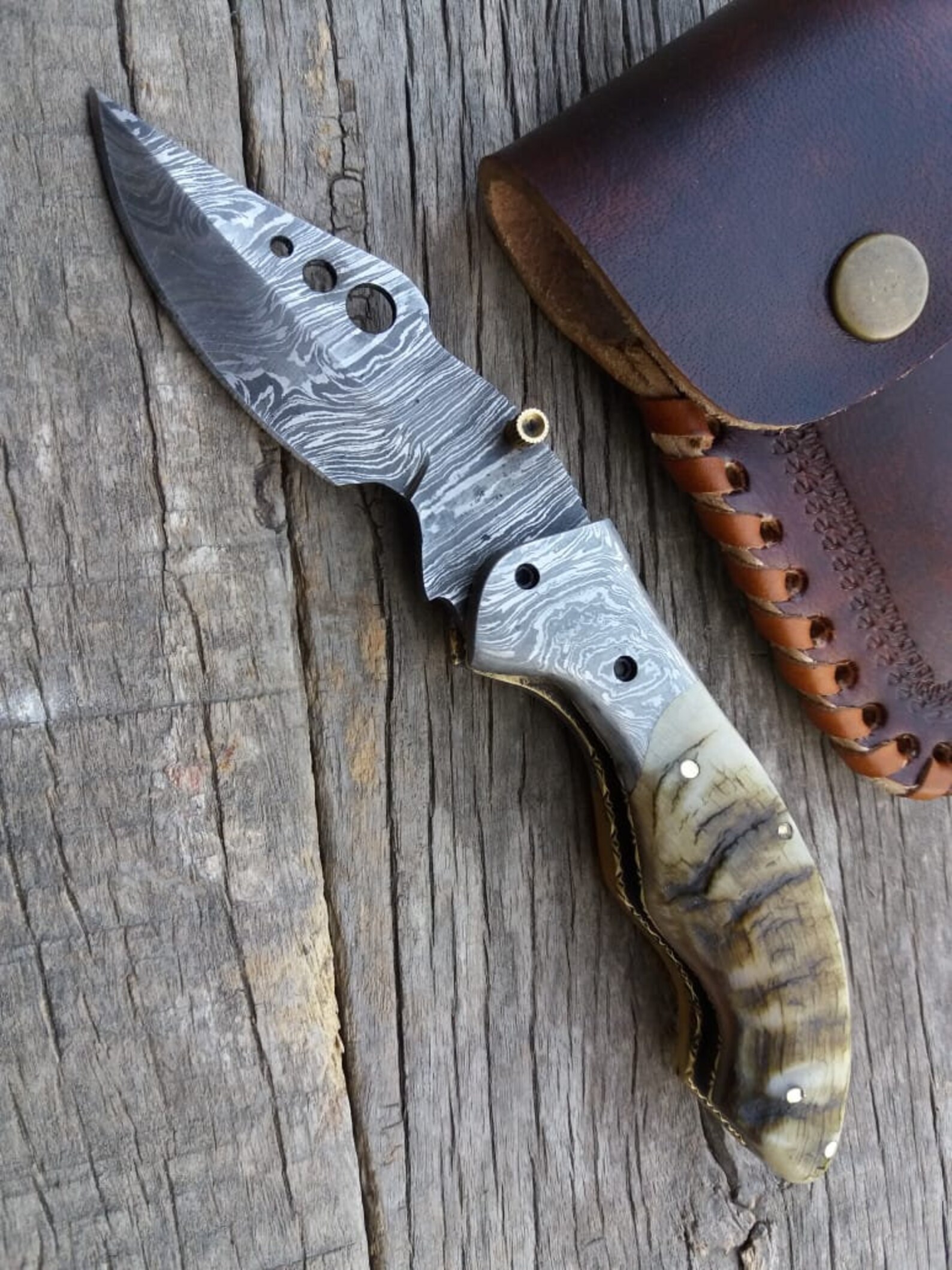 Premium Damascus Steel Folding Knife with Sheep Horn Handle