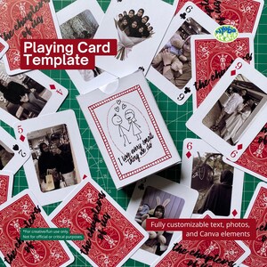 May include: A deck of playing cards with red backs and white faces, scattered around a white card box. The box features a red border and a drawing of two stick figures holding hands. The cards have photos.