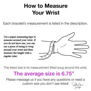 May include: A diagram showing how to measure your wrist for a bracelet. The text says "How to Measure Your Wrist" and "The average size is 6.75" inches.