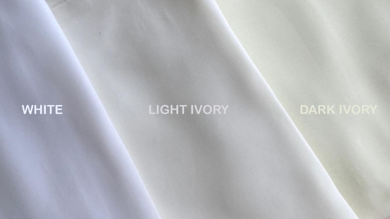 A neatly arranged image showcasing twi sheer fabric swatches in soft, neutral tones. The left side display white and right side display Ivory. The fabrics’ delicate textures and subtle color differences are clearly visible under soft lighting.