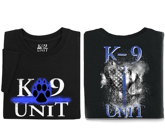 May include: Two black t-shirts with a blue line and the text "K-9 UNIT". One shirt features a paw print and the other features a dog's head.