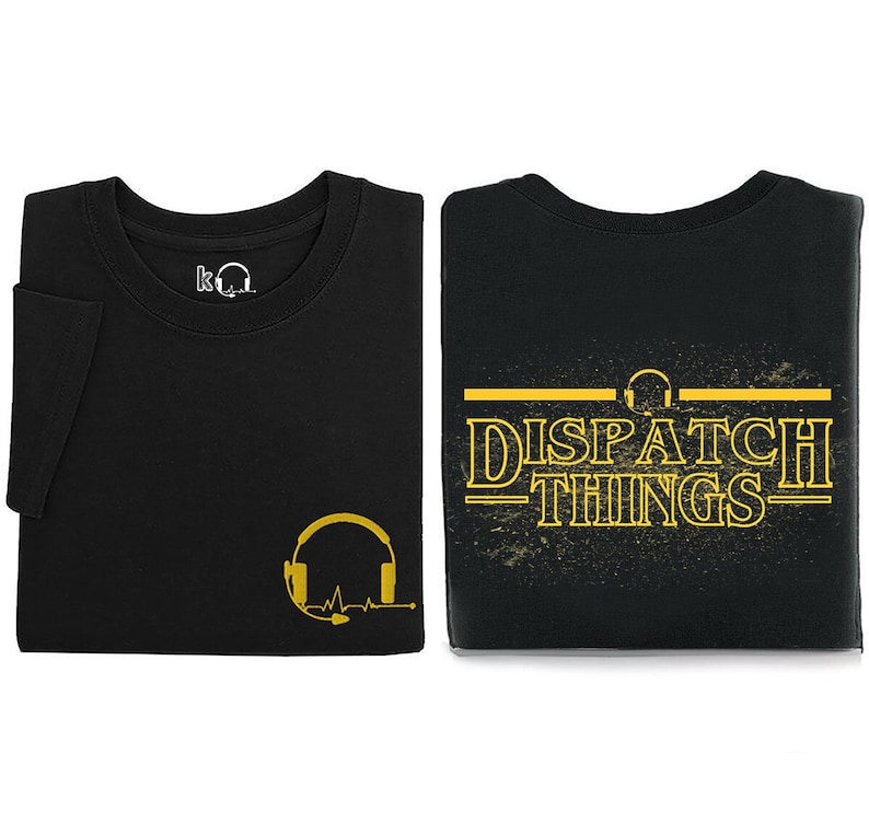 May include: Two black t-shirts with a yellow graphic design. One shirt features a headset with a heartbeat line and the other shirt features the text "DISPATCH THINGS" with a headset above the text.