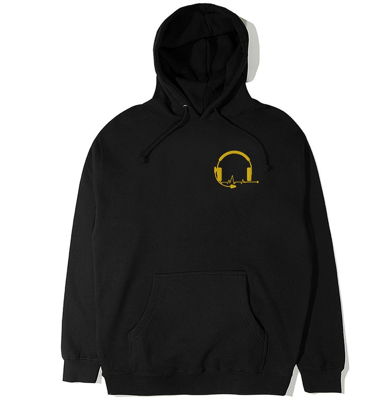 May include: Black hooded sweatshirt with a gold graphic of a headset with a heartbeat line.