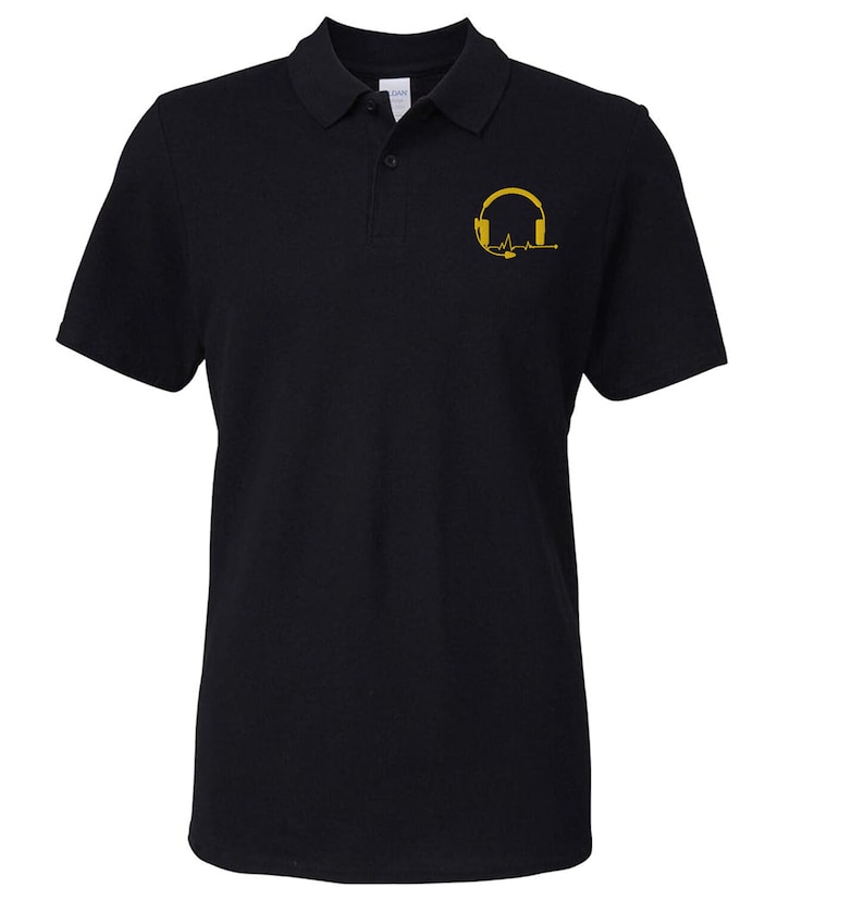 May include: Black polo shirt with a gold embroidered design of headphones with a heartbeat line.