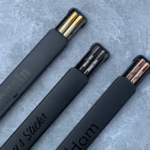 color options: gold, black and rose gold personalized engraved chopsticks with a personalized or blank black pull box case.