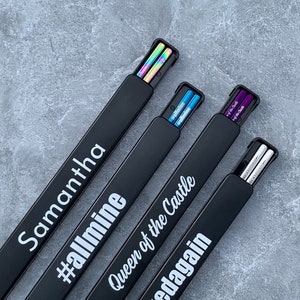 solid color options: rainbow, blue, purple and silver personalized engraved chopsticks with a personalized or blank black pull box case.