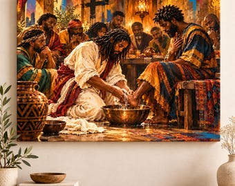 May include: A canvas wall art print depicting a scene of a person with long dark hair washing the feet of another person in a metal basin. The figures wear textured, colorful robes in a dimly lit room with other people seated at a wooden table.