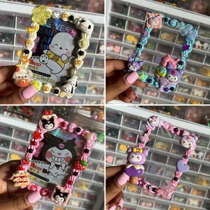 May include: Four decorative photo frames with cartoon character designs. Each frame is rectangular and embellished with colourful beads, pearls, and miniature figurines. The frames feature characters like a white dog, a purple cat, and a smiling black cat.